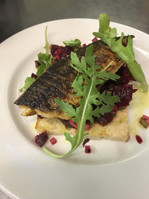 Pan-fried fish with rocket and beetroot